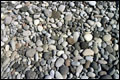 Kieselsteine am Strand von Puerto Naos